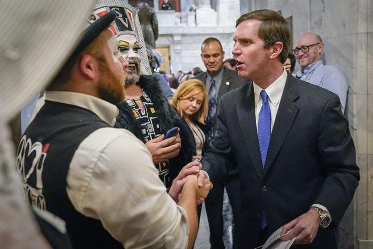 Beshear with drag queens AP photo.jpeg