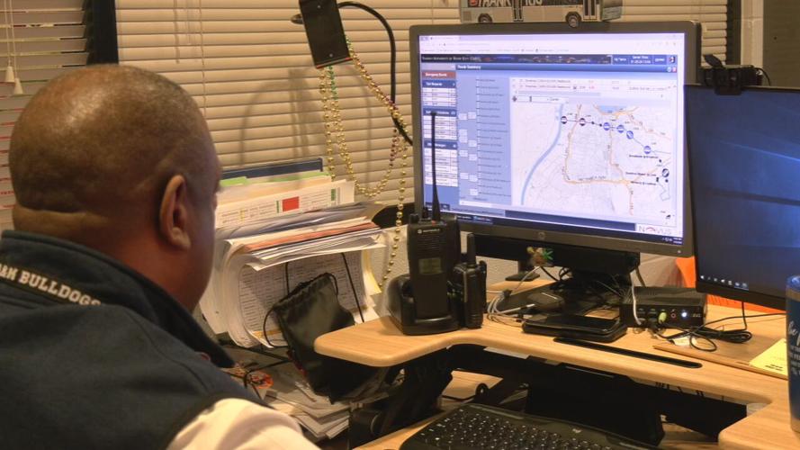 TARC employee at computer screen