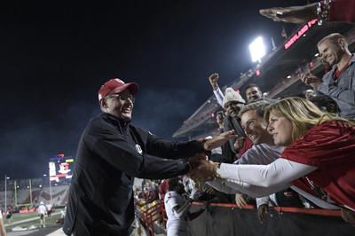 Indiana head coach Tom Allen celebrates with fans