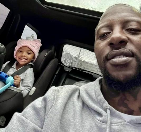 Bryant Johnson driving with daughter.jpg