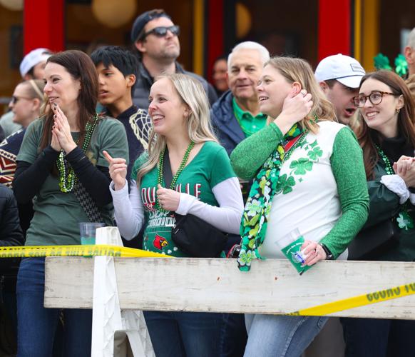 People wave during St. Patrick's Day Parade.JPG