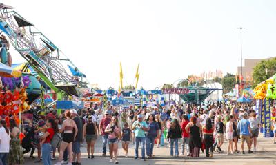 People walk around Midway at Kentucky State Fair.JPG
