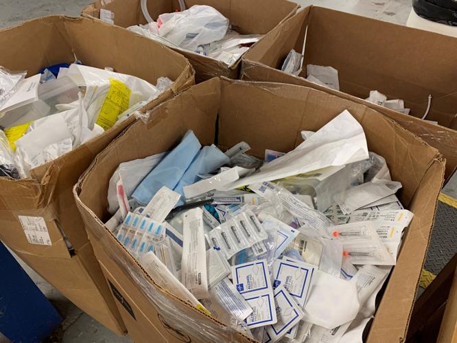 Volunteers at Louisville-based SOS assemble medical kits bound for Ukraine