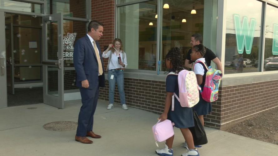 JCPS superintendent Dr. Marty Pollio welcomes students to Perry Elementary