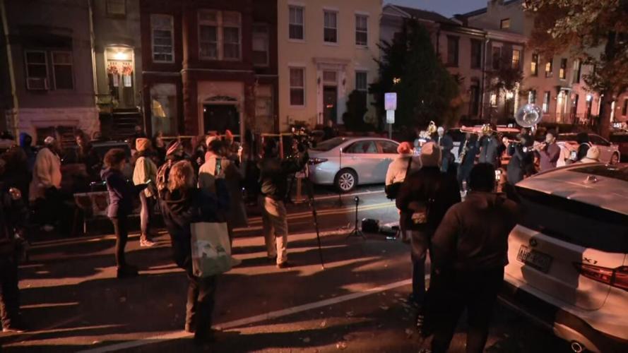 Protesters outside US Sen. Mitch McConnell's Washington DC home on Sunday, Nov. 14. 2021