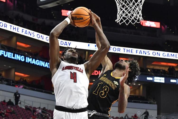 Louisville forward Roosevelt Wheeler rises for a shot against Southeastern Louisiana.jpeg
