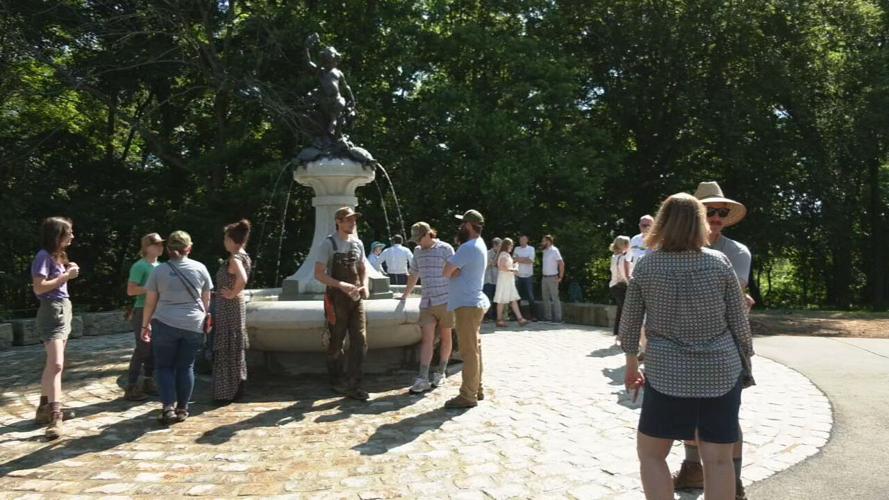 Attendees of the ribbon-cutting for the restored Hogan's Fountain in Cherokee Park