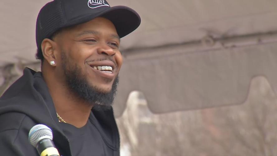 Kenneth Walker speaks during a rally marking one-year anniversary of Breonna Taylor's death