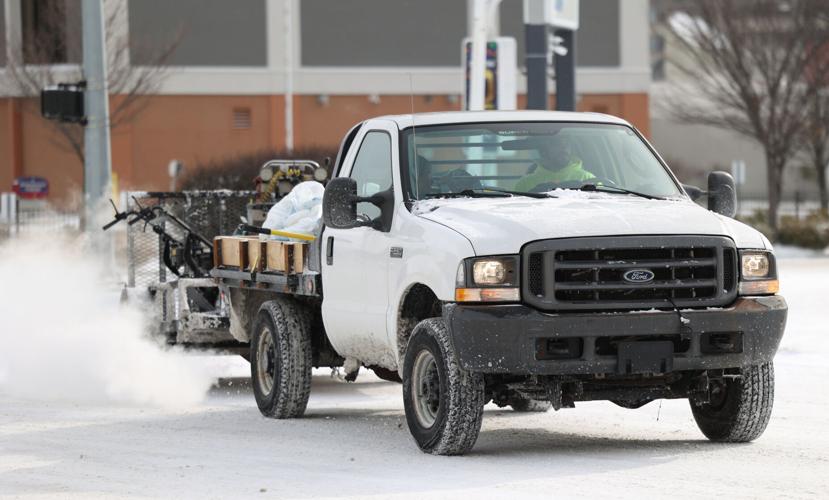 Truck drives through snow.JPG