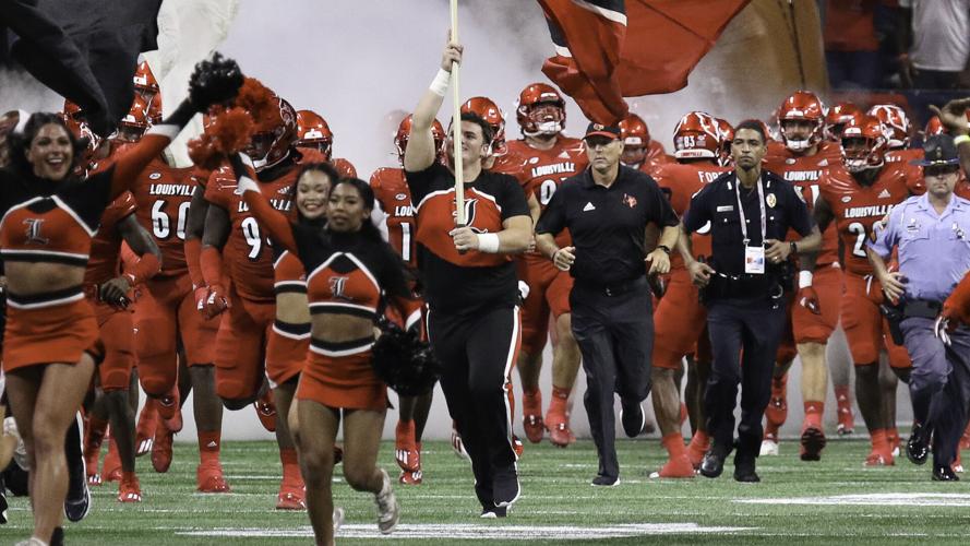 Louisville takes the field