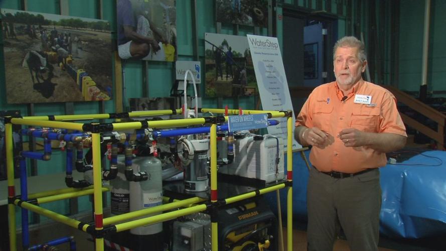 Curtis Daniels shows off WaterStep's Water on Wheels Disaster Response System