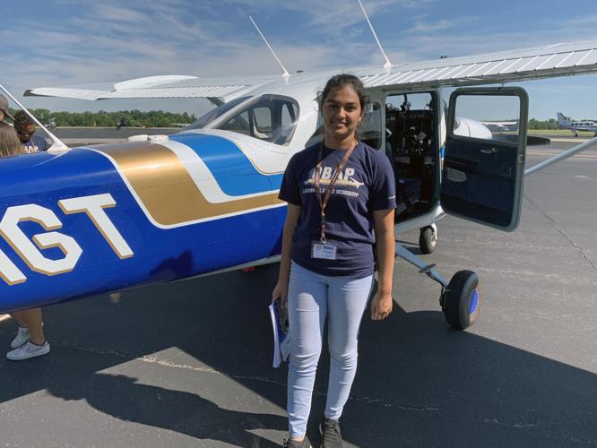 Student in the OBAP Shawnee ACE Academy taking a flight on a small plane at Louisville's Bowman Field