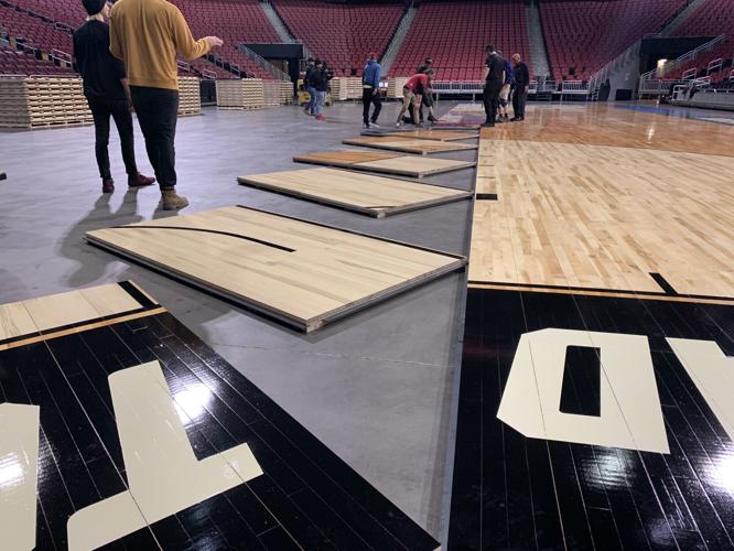 NCAA men's tournament court installed in KFC Yum! Center for South Regional  games