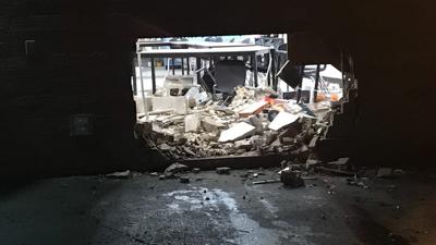 Hole in wall of Scottsburg High School after suspected DUI crash 4-28-19