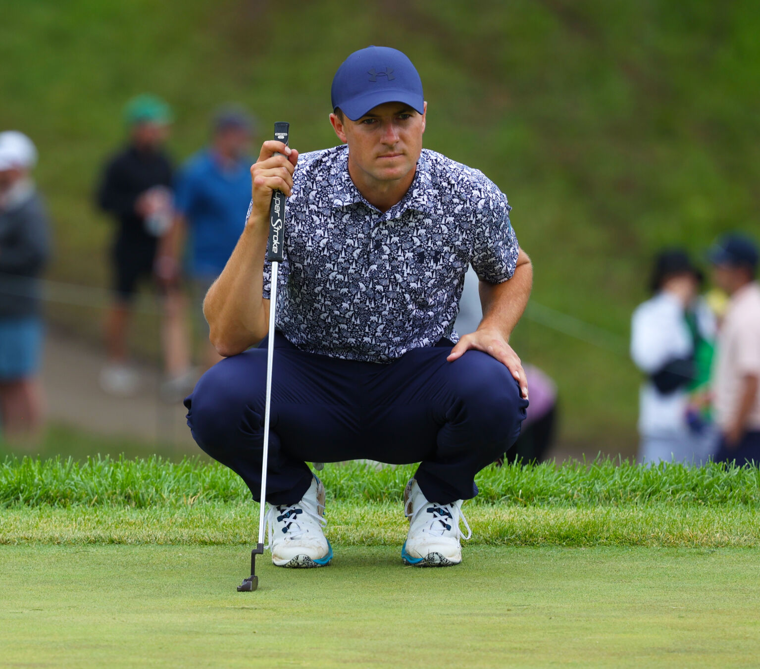 Jordan Spieth prepares for a putt on 12th green.JPG