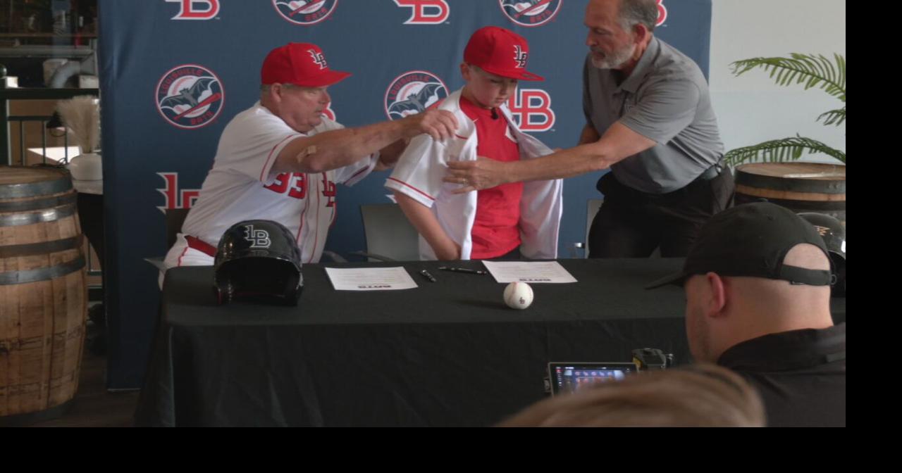 9-year-old signs 1-day contract with Louisville Bats, throws out 1st pitch