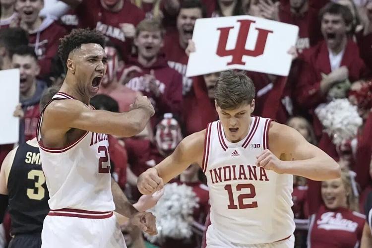 Indiana's Trayce Jackson-Davis reacts with Miller Kopp.jpg