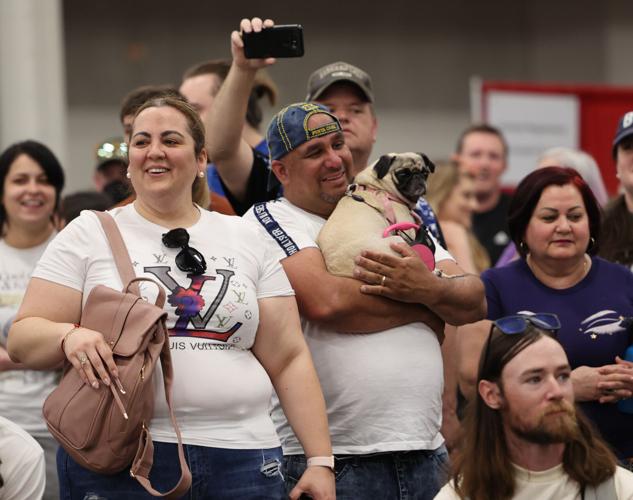 Person celebrates after pug race