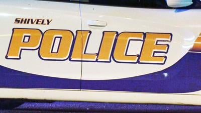 The Shively Police Department logo on the side of a cruiser