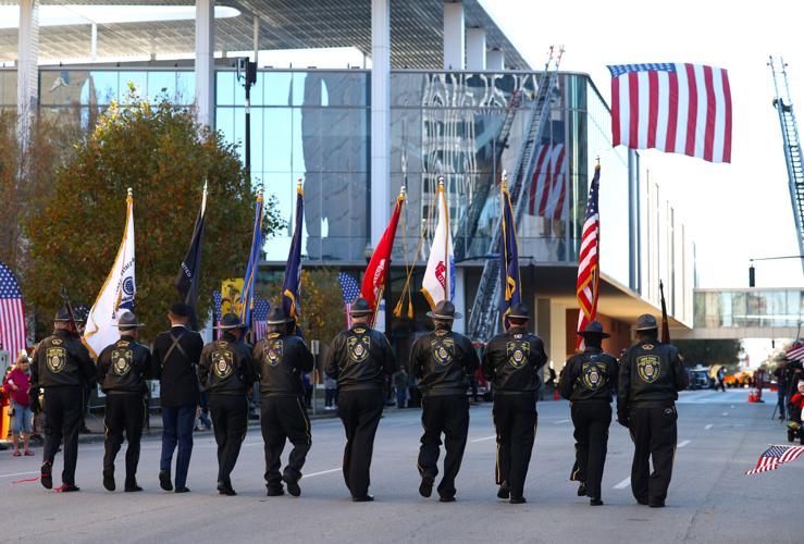 Flags march at Veterans Day Parade.JPG