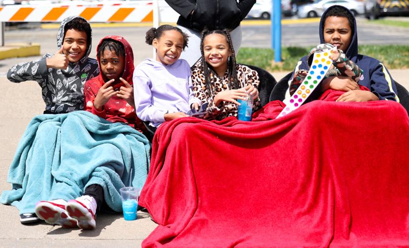 Family on Broadway smiles for photo.JPG