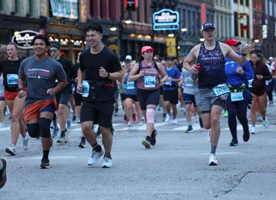 Main Street runners at KDF Marathon.JPG