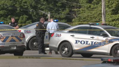 LMPD officers at homicide scene-generic.jpeg
