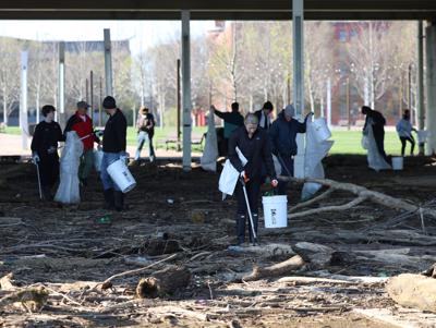Volunteers clear debris at Waterfront Park