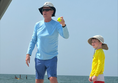 Grandfather and grandson post knee replacement surgery