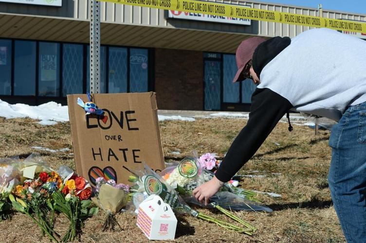 Love Over Hate Sign at Club Q shooting memorial