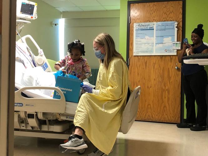 Children receive stuffed animals for Valentine's Day at Norton Healthcare.jpeg