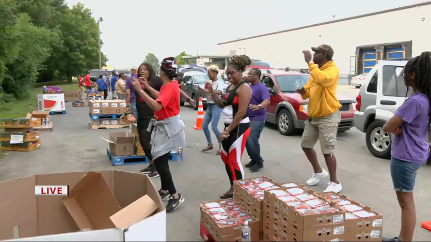 Juneteenth volunteers outside Dare to Care