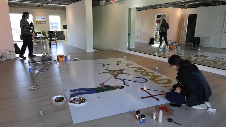 Artists prepare La Posada mural
