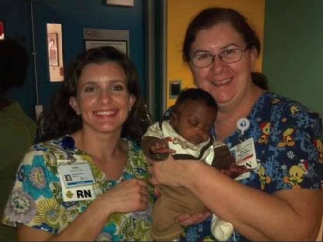 Baby Kaden with nurses from Kosair's NICU unit in Louisville