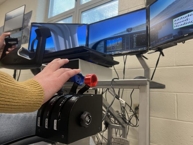 Student uses flight simulator at Breckinridge County H.S.