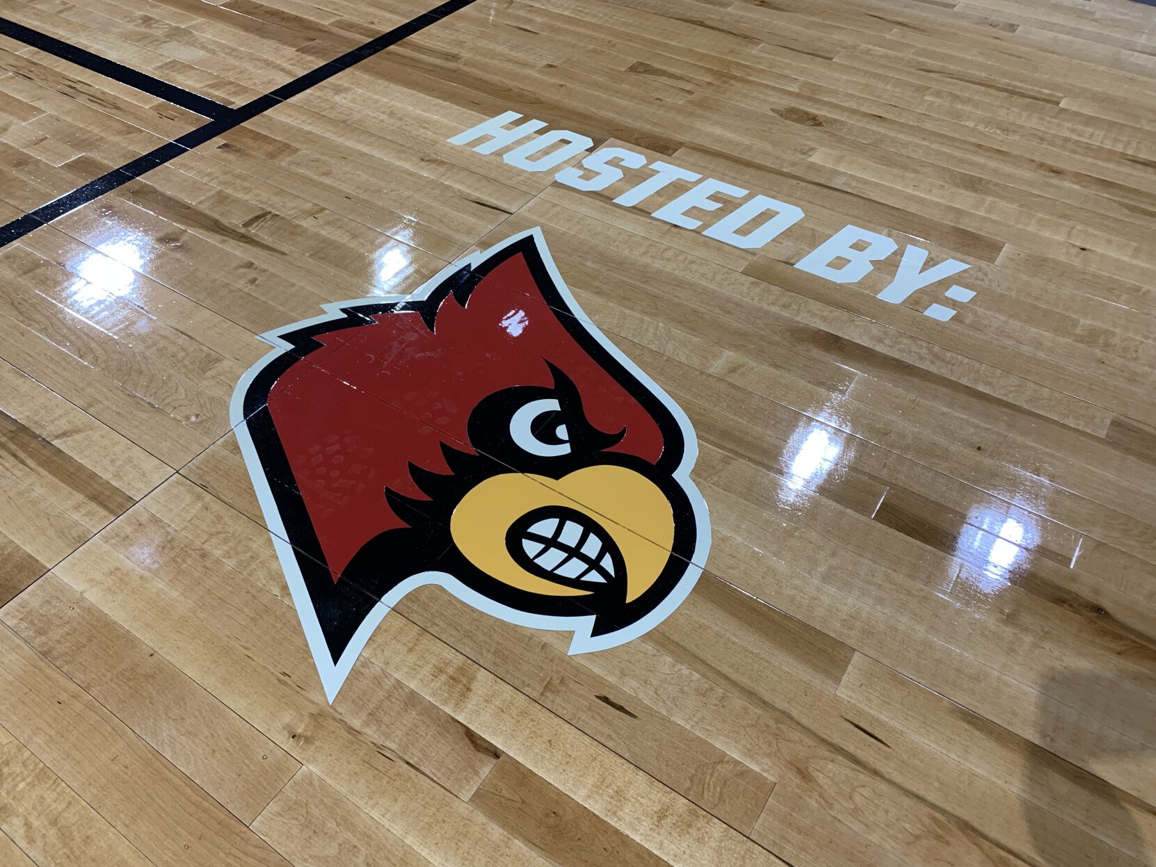 NCAA FLOOR  BEING INSTALLED AT YUM CENTER 3-21-2023 (2).JPG