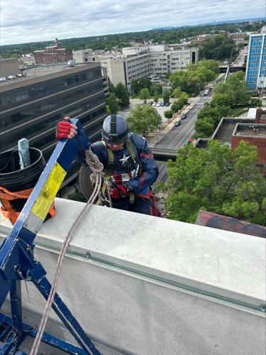 Window washers rappel from Norton Children's Hospital dressed as superheroes