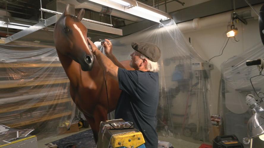 Mike Prather repaints Derby horse for museum's Winner's Circle display