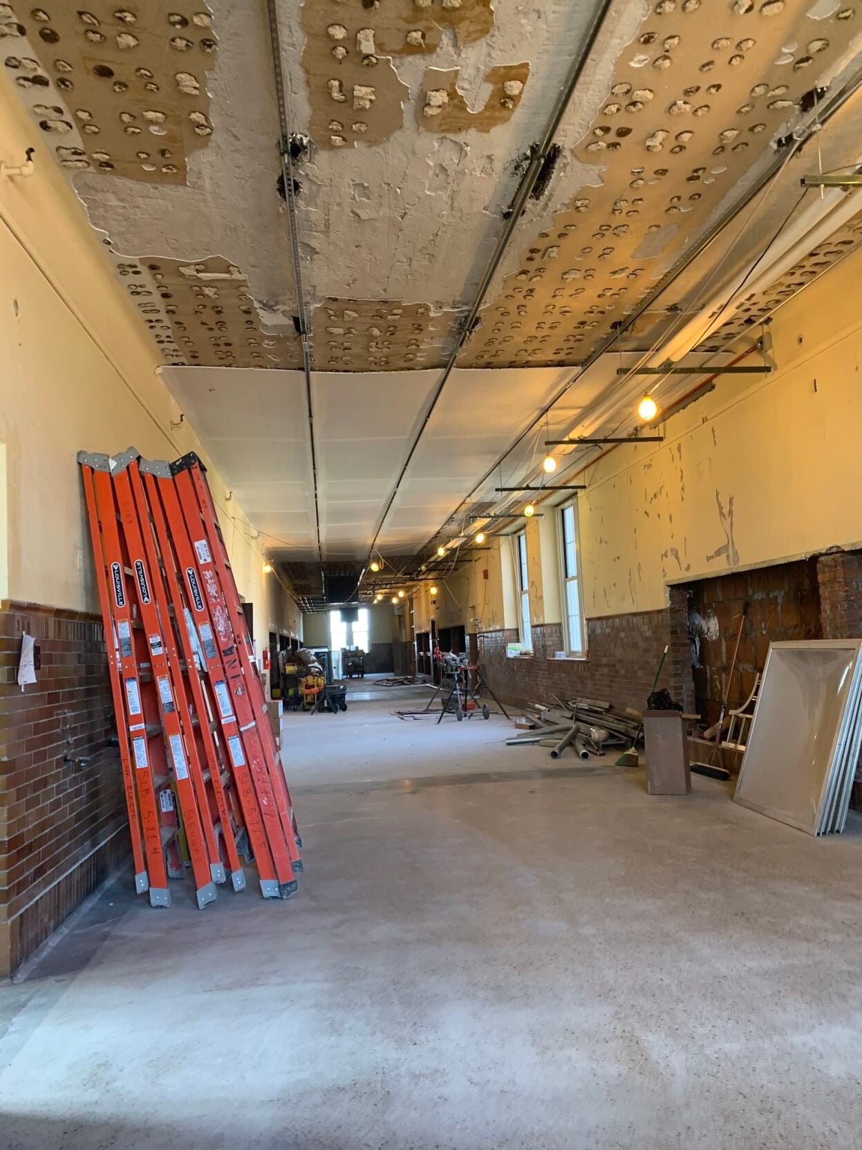 Shawnee hallway under construction, lockers removed