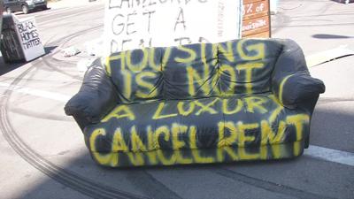 Anti-eviction protest couch in street 8-8-20