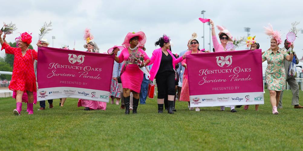 Survivors Parade moves on turf track.JPG