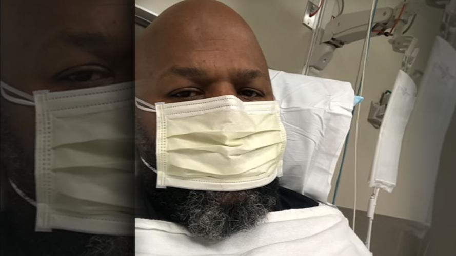 Doug Willis COVID-19 patient with face mask.jpg