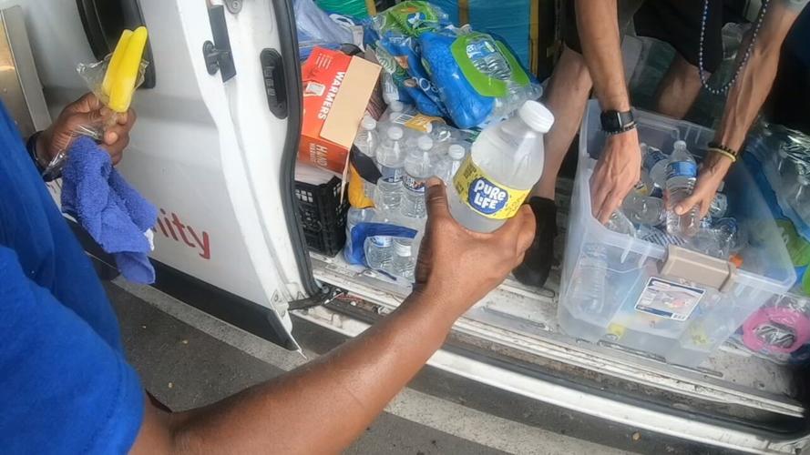 Hip Hop Cares passing out water bottles, supplies during heat wave