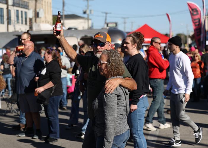 Louisville's Great Chili Cook off - man holds beer.JPG