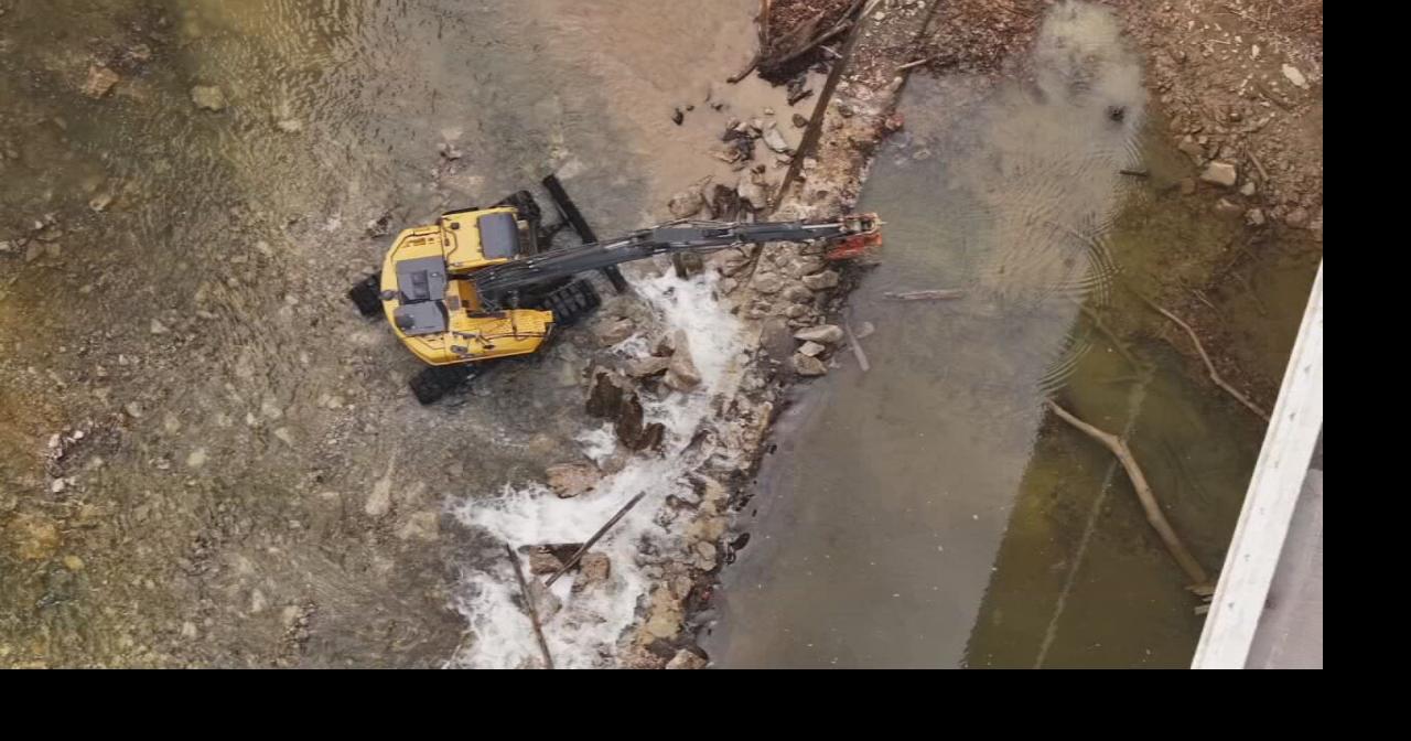 Crews begin removing Providence Mill Dam on Silver Creek in New Albany