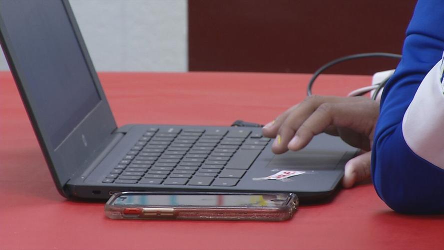 student with laptop generic.jpeg