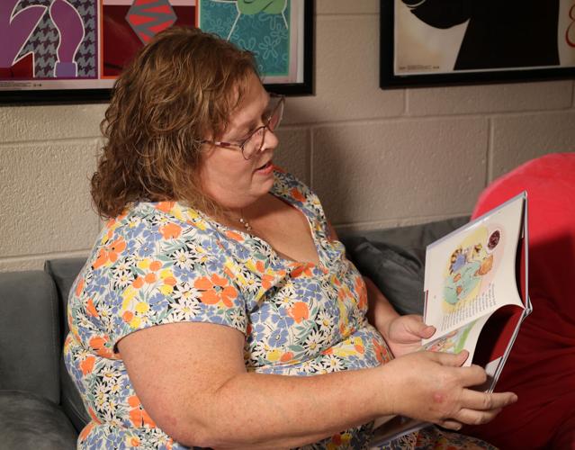 Lisa Overstreet reads a children's book