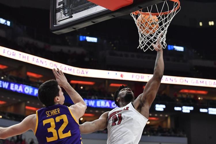 Louisville forward Sydney Curry puts up a shot.jpeg