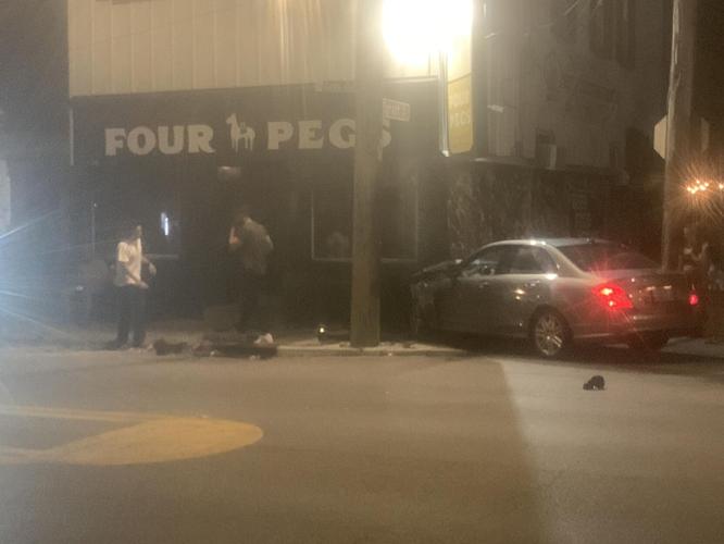 Four Pegs car into building.jpg