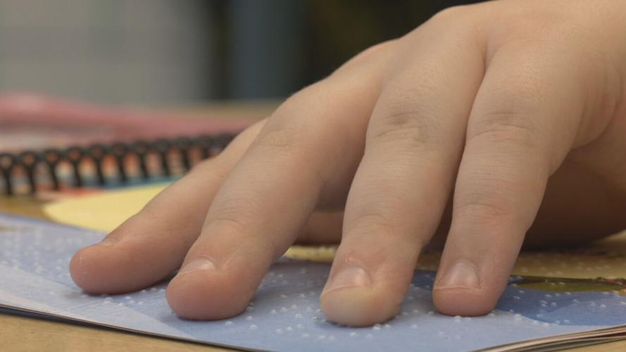 Malakai braille book read (5).jpeg